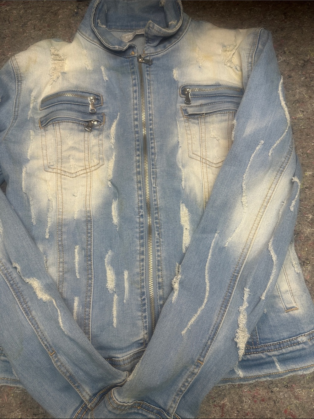 Distressed Light Blue Denim Jacket with Zip Front